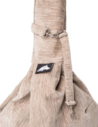Sierra Sling in Taupe, close-up of the strap clip and chenille fabric