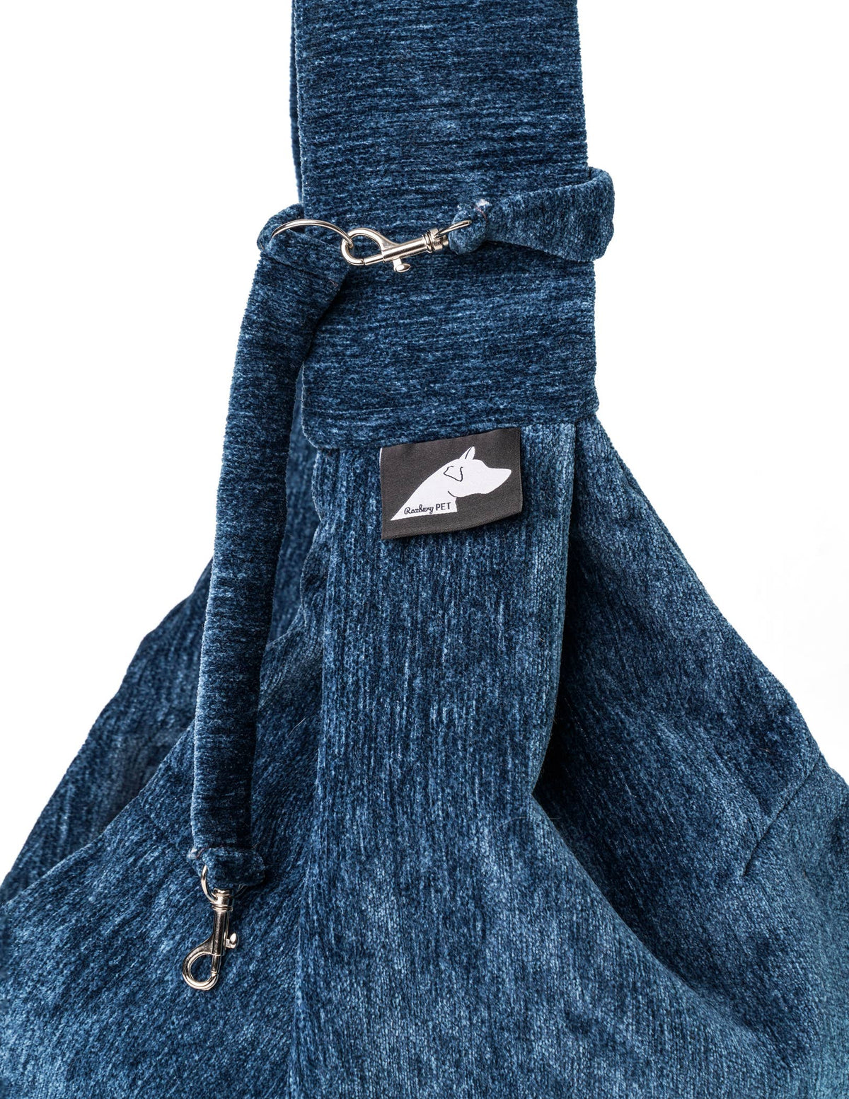 Sierra Sling in Navy, close-up of the strap clip and chenille fabric