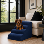 4-step Henley Doxie Stairs in navy beside a cream sofa, a dachshund sitting on the top step [dachshund]
