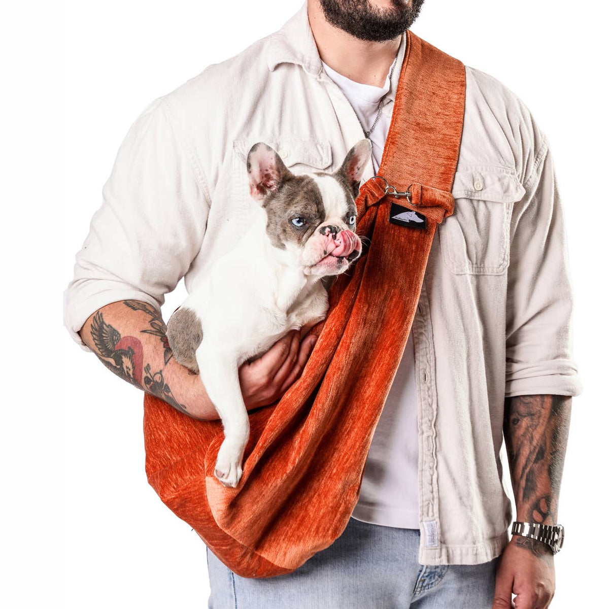 Sierra Sling pet carrier in Autumn, worn with a French bulldog inside