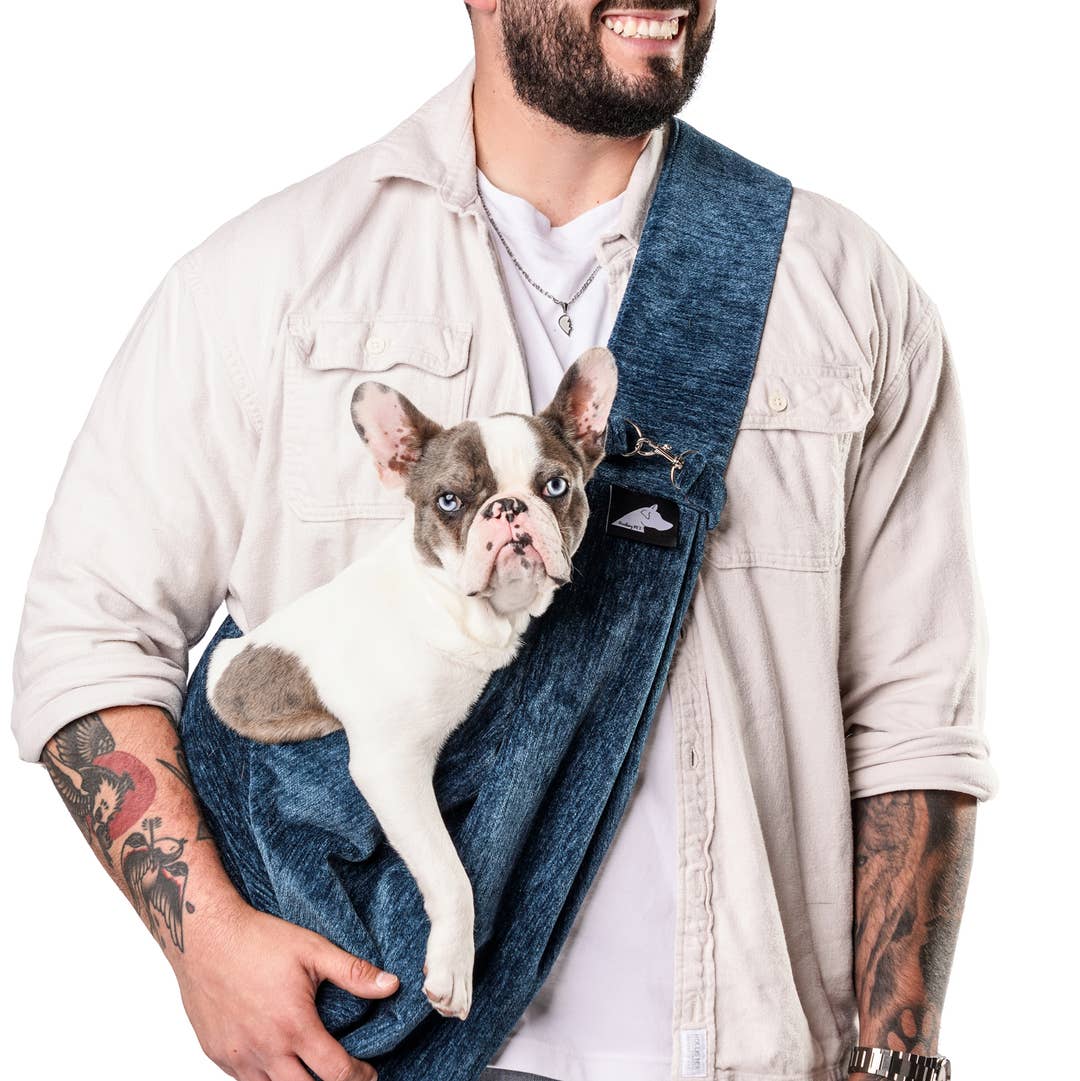 Sierra Sling pet carrier in Navy, worn with a French bulldog inside